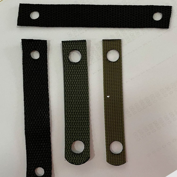 Automatic webbing laser cutting machine and webbing hole punch