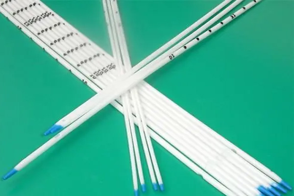 Laser marking process for medical stainless steel round tubes