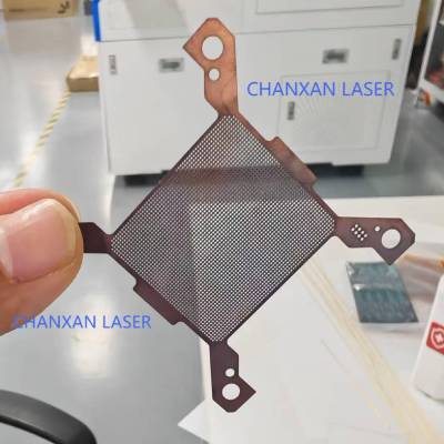 Laser drilling of semiconductor chip test sockets
