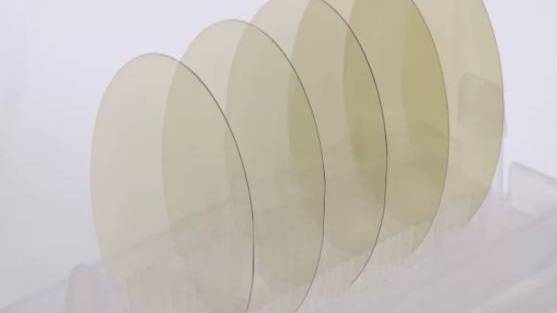 Laser Slotting and Drilling Technology for Microfluidic Biochip